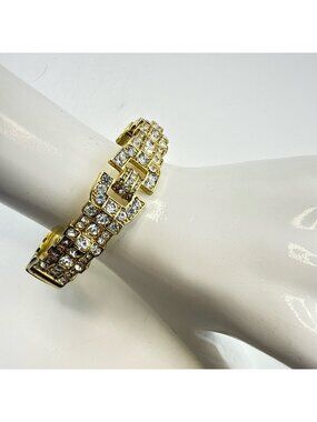 Heidi Daus Bangle Bracelet Sparkling Sensation Hinged Bright Gold Tone Signed